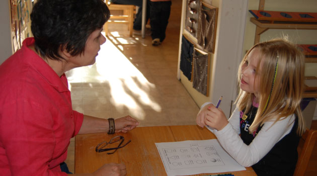 One-on-one, child and French teacher